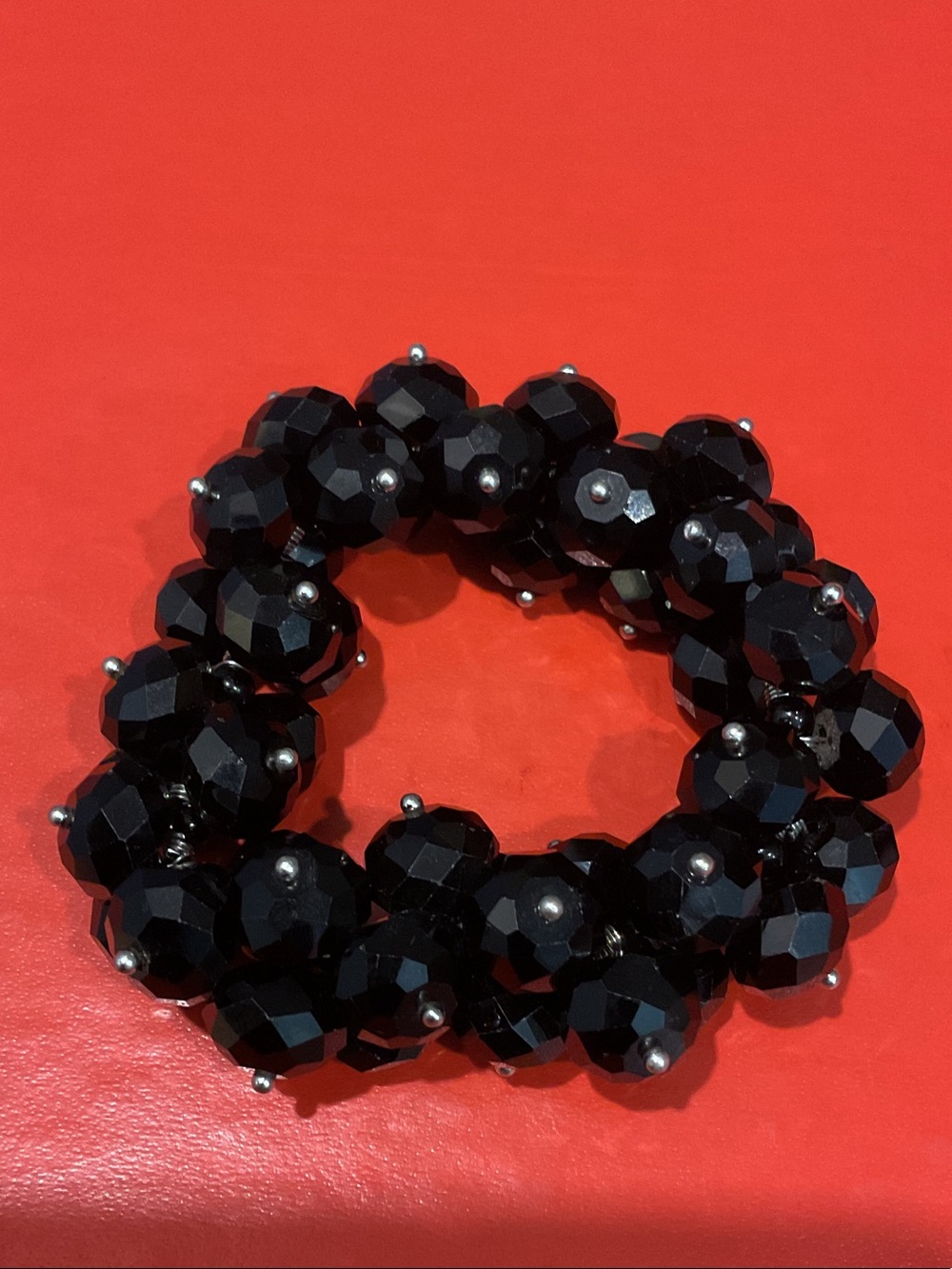 Black beaded stretch plastic bracelet